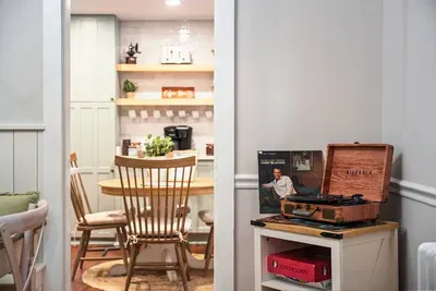 Pick a record and enjoy the serenity in the spacious dining room with seating for all!