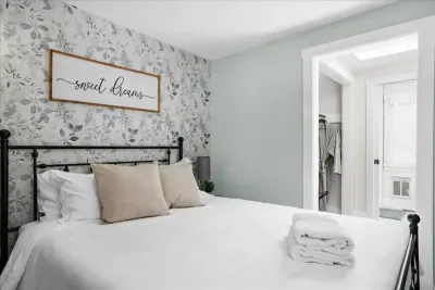 Bedroom 3, equipped with a Queen foam mattress and en suite full shower bathroom for your convenience and comfort!