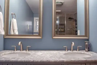 Private double vanity and full bathroom in the king suite for convenience.