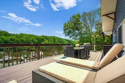 Relax in the sun loungers and outdoor furniture conveniently located on the back deck facing the water views!