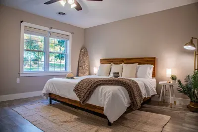 Designed for the ultimate relaxation the king suite will check all of your boxes for comfort!  From the king mattress, makeup station, 43" TV, and private full bathroom you'll never want to leave your bedroom.
