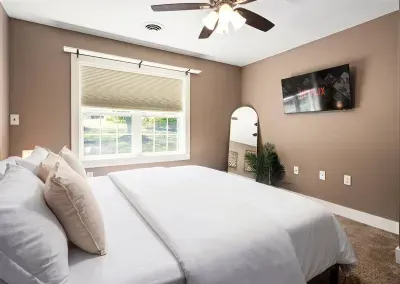 King bedroom #2 with a 43" smart TV, full length mirror, and closet space for all of your needs!