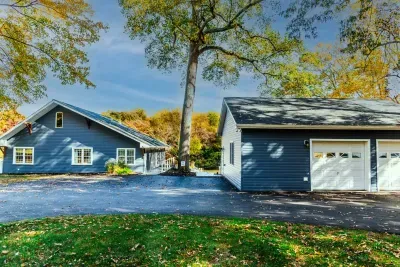 We have a large, paved parking area for all guests.  The main house (left) and game room (right) are both available to all guests during your stay.