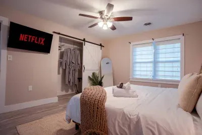 King suite elegantly designed to ensure maximum comfort with your own private robes, 43" smart TV, closet space, full length mirror, and private full bathroom.