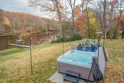 Additional photo of the fire pit area and 8 person Bull Frog hot tub.