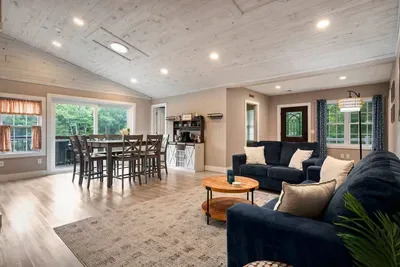 Enjoy down time with friends and family in the spacious living room/dining room area.