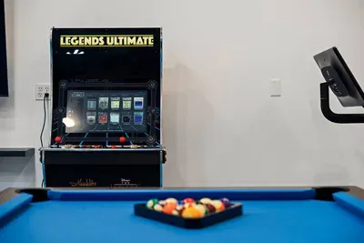 Let the kids play in the game room while you unwind in the hot tub!