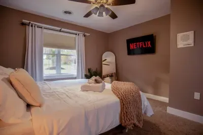 King bedroom #2 with a 43" smart TV, full length mirror, and closet space for all of your needs!