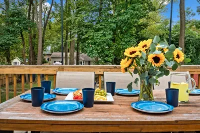 Outdoor dining for 8 on the walk out back deck.