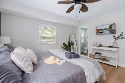 King suite image #5 with private half bathroom and TV for your ultimate comfort or catching up on your favorite streaming shows!