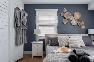 Cozy king suite with private half bath located on the upstairs level