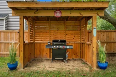 Propane grill fully covered to ensure the chef has a cool, dry place to cook year round.