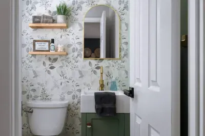 King suite half bathroom with sink and toilet for convenience