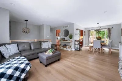 A view of our upstairs living room, dining room, and kitchen.