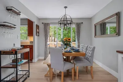 Dining room with seating for 8 with beautiful views to the backyard and deck area.