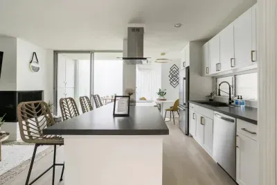 Hillside Hideaway I ~ Galley style kitchen open to living space