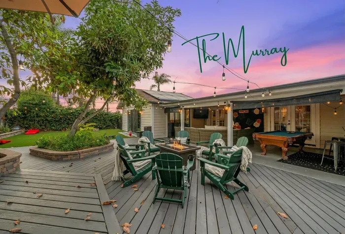 Gather round the fire pit with seating for 8