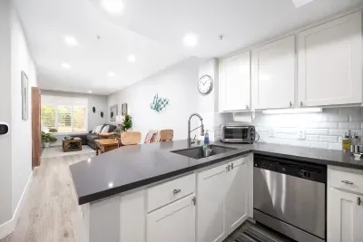 Kitchen looking out on to living room
