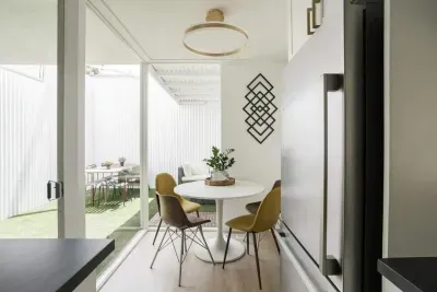 Cutest little dining nook - perfect for working remote or enjoying morning coffee. Also perfect for a work station with power under the table and natural light.