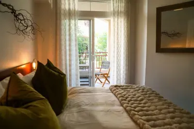 Bedroom opens on to balcony