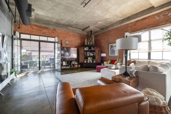 Spacious Living Room w/ Exposed Brick Walls