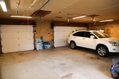 3 car garage w/ additional gated parking