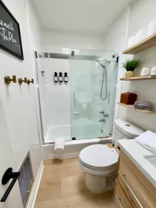 King Bedroom with attached bathroom with bathtub / shower