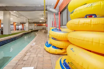 Indoor lazy river with tubes for year-round family fun