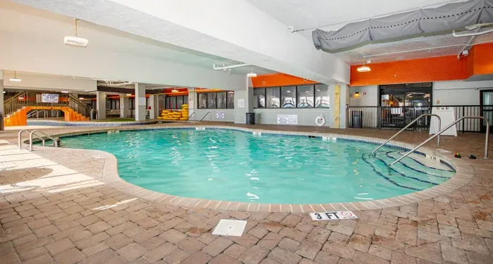 Spacious indoor pool with easy-entry steps for year-round family fun