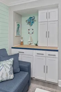 Coastal-inspired built-in storage with charming beachy decor