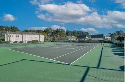 On-site fenced tennis courts—perfect for a sunny match just steps away.