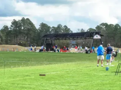 Steps from a scenic driving range—perfect for golf getaways.