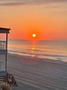 Oceanfront balcony sunrise views + private steps to wide sandy beach