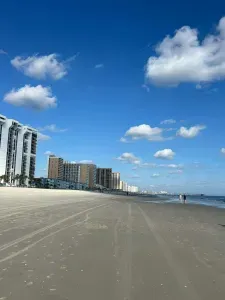 Wide, uncrowded beach by the resort—endless ocean views & easy strolls.