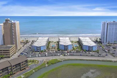 The condo is located in the middle building