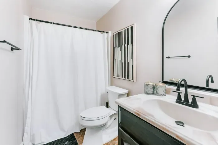 Clean, comfortable bathroom with classic finishes and everyday convenience.