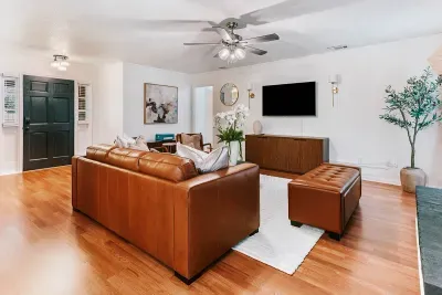 Spacious living room designed for lounging, movie nights, and gathering together with ease.