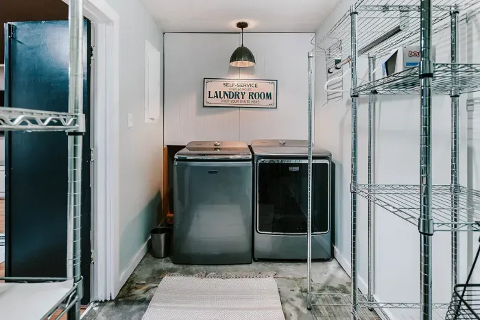Dedicated laundry space with full-size machines for added convenience during your stay.