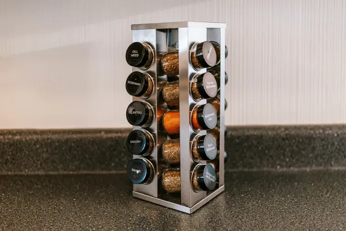 Well-stocked spice rack adds a thoughtful touch for home-cooked meals.