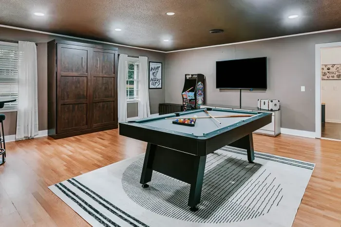 Spacious game room designed for entertainment, competition, and laid-back fun.