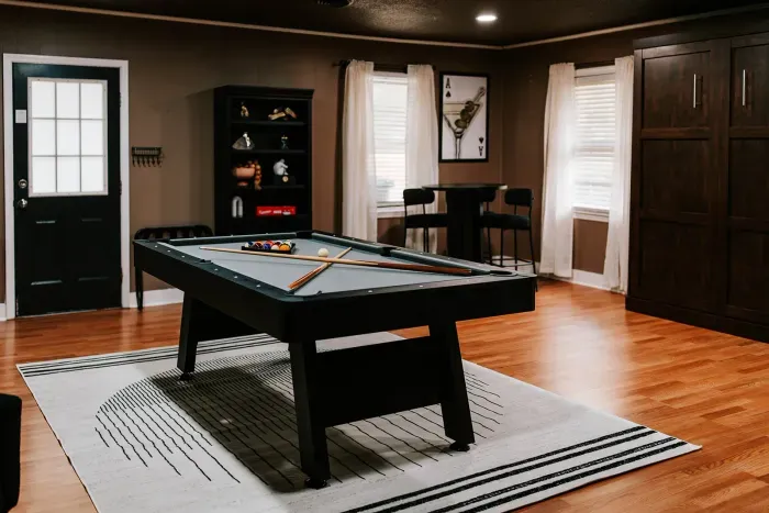 Spacious game room designed for entertainment, competition, and laid-back fun.