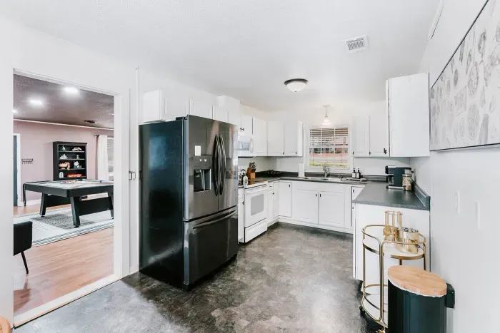 Bright, well-equipped kitchen designed for cooking, gathering, and everyday ease.