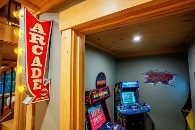 Enter an exciting arcade room with three machines offering a mix of classic and new games. Relive nostalgic moments or dive into fresh gaming experiences in a lively atmosphere filled with vibrant lights and retro tunes, perfect for all gamers.
