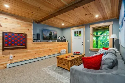 Step into a game room built for ultimate enjoyment! Challenge friends with an Xbox featuring Game Pass for nonstop adventures, test your skills with classic board games, or settle in front of the smart TV for epic streaming. Fun and relaxation await!