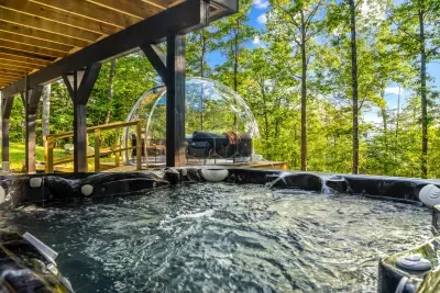 Indulge in ultimate relaxation with our new luxurious hot tub, the perfect retreat for unwinding. Bask in the soothing jets and warm embrace, enveloped by a tranquil setting that enhances serenity. It's your ideal getaway for peace and rejuvenation.