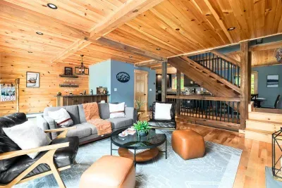 Our chalet's open floor plan is designed to let laughter and conversations flow. Imagine gathering around the inviting living area, where the indoor gas fireplace casts a cozy glow, fostering conversations and unforgettable memories. 