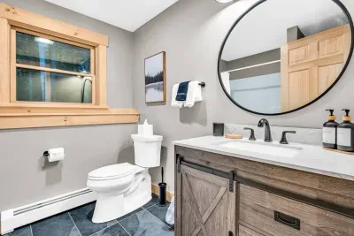 Introducing our downstairs full bathroom, complete with a relaxing bathtub for your comfort and convenience.