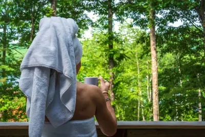 Start your mornings on the deck, coffee in hand, as the soft light of dawn reveals a breathtaking view of lush trees and a tranquil lake in the distance. It’s the perfect spot to unwind, soak in nature’s calm, and savor the serenity of a new day.