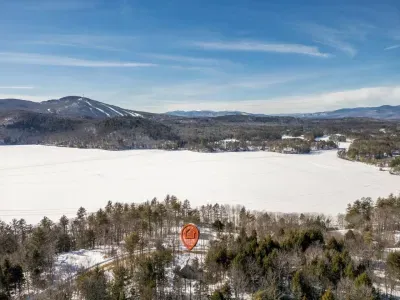 The chalet is situated directly opposite two expansive lakes, offering a prime location.