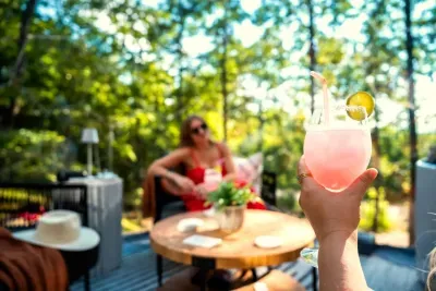 Craft your favorite cocktail inside at our wet bar then bring the indoors outside to the dome!  Cheers!